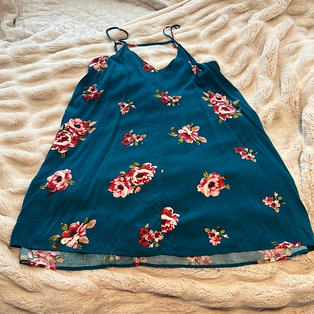 Blue floral spaghetti strap dress. Staccato size M